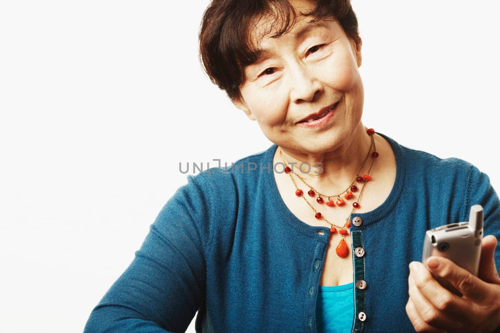 Portrait of a mature woman holding a mobile phone