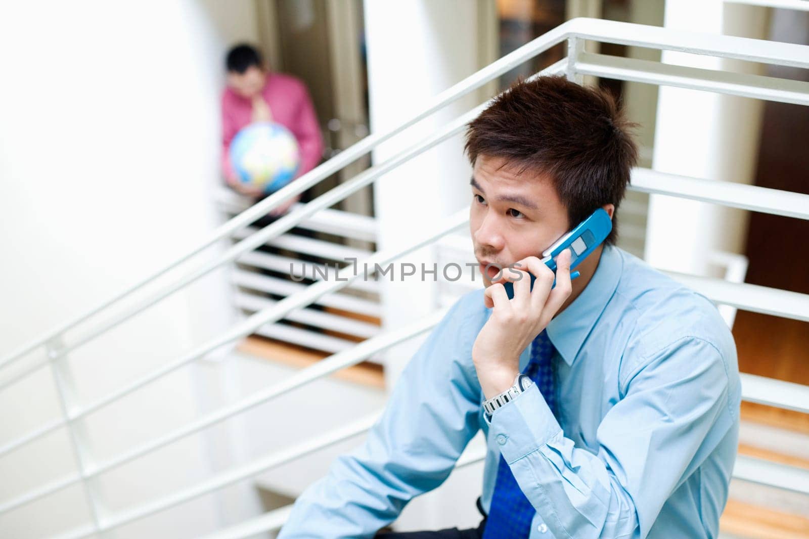 Close-up of a businessman talking on a mobile phone