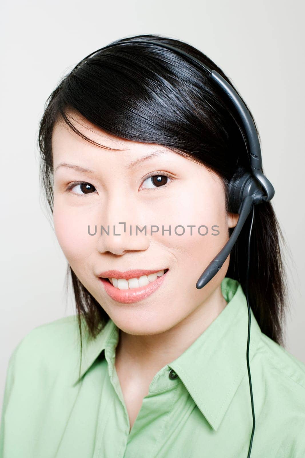 Portrait of a female customer service representative using a headset
