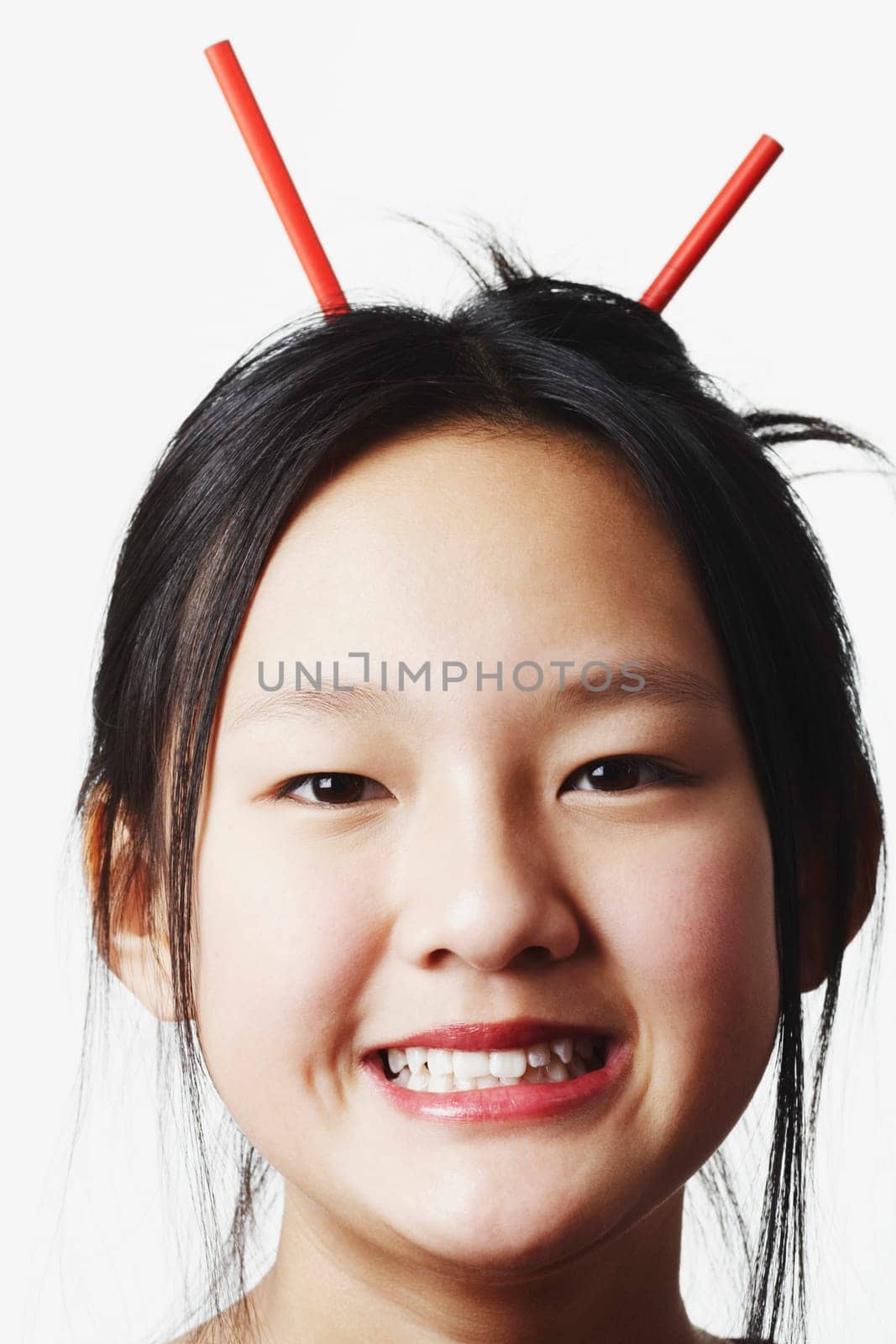 Portrait of a teenage girl clenching her teeth