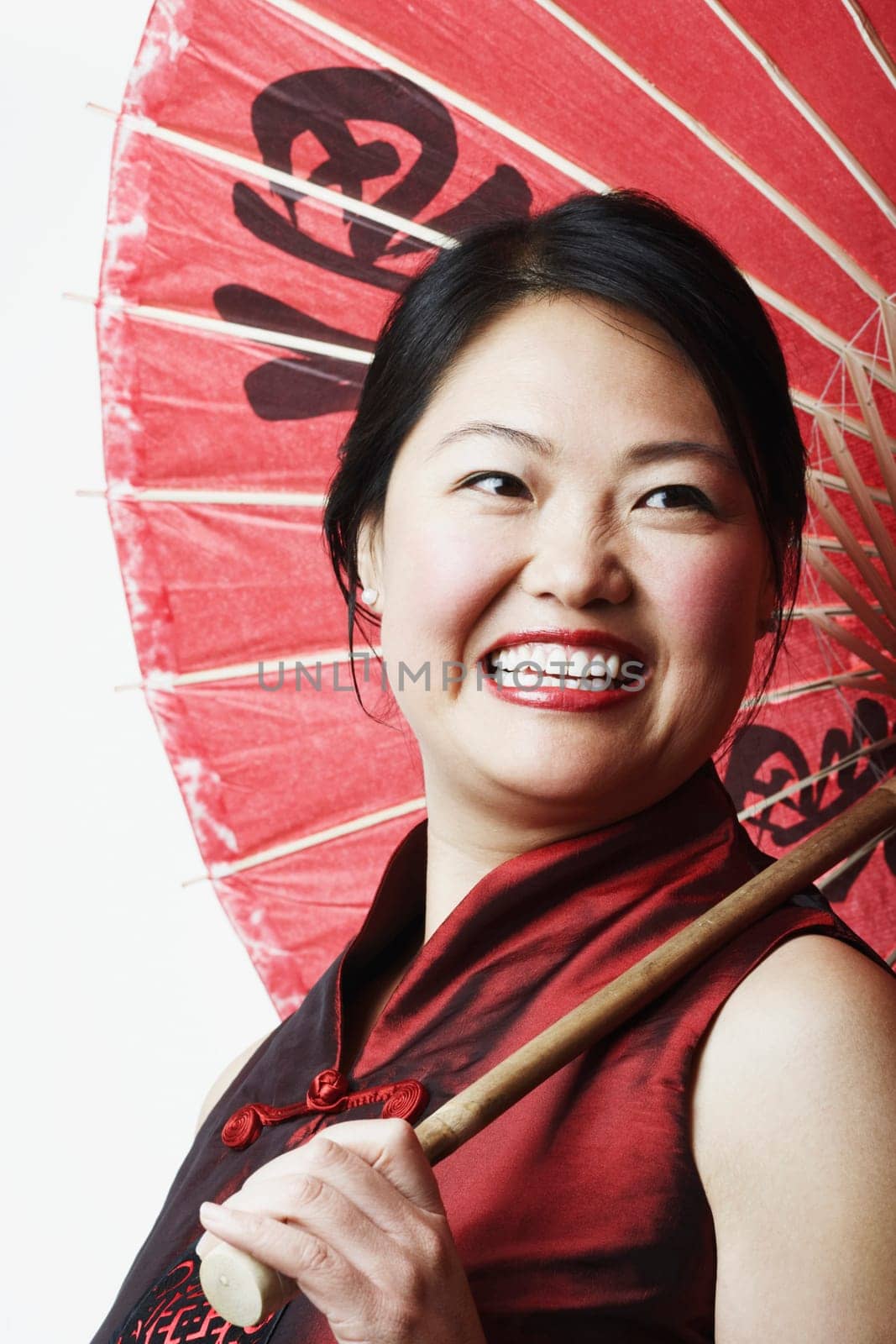 Close-up of a mid adult woman holding a parasol