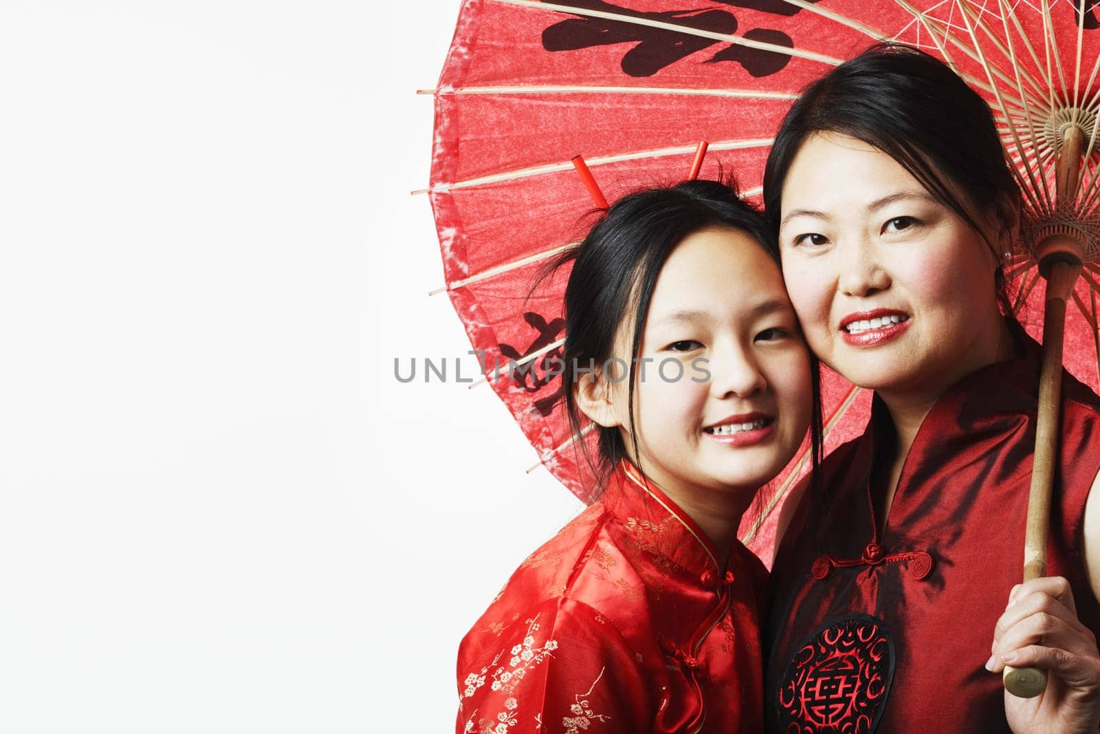 Portrait of a mother and her daughter smiling