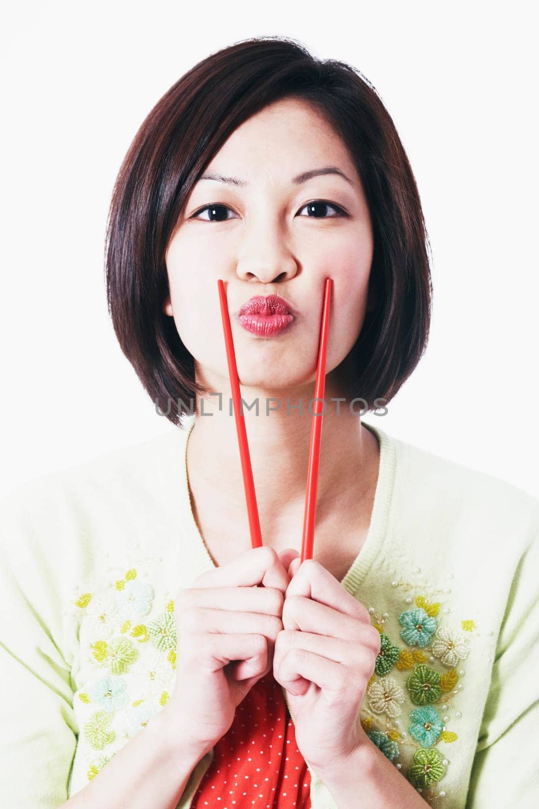 Portrait of a young woman puckering