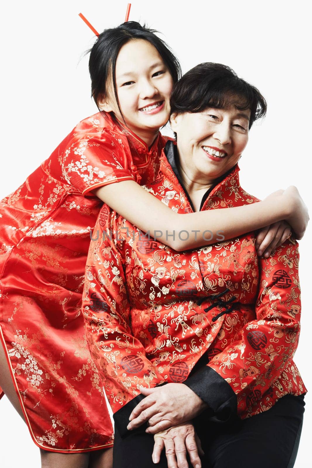 Portrait of a granddaughter hugging her grandmother