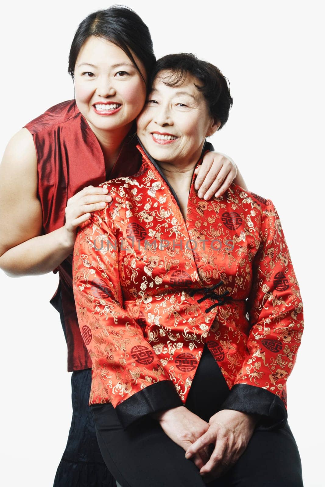 Portrait of a girl standing behind her mother