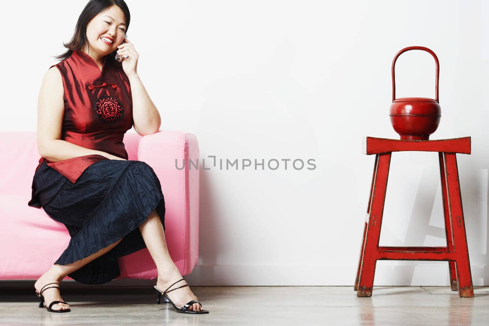Mid adult woman talking on a mobile phone