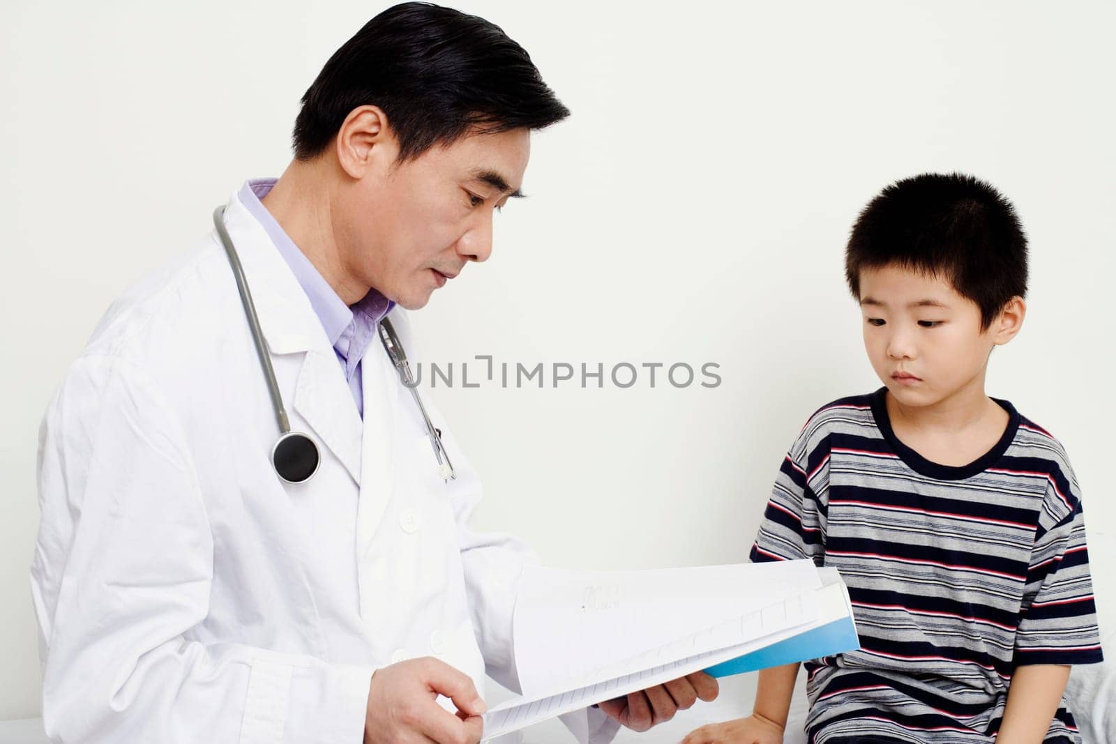 Close-up of a doctor looking at a medical report