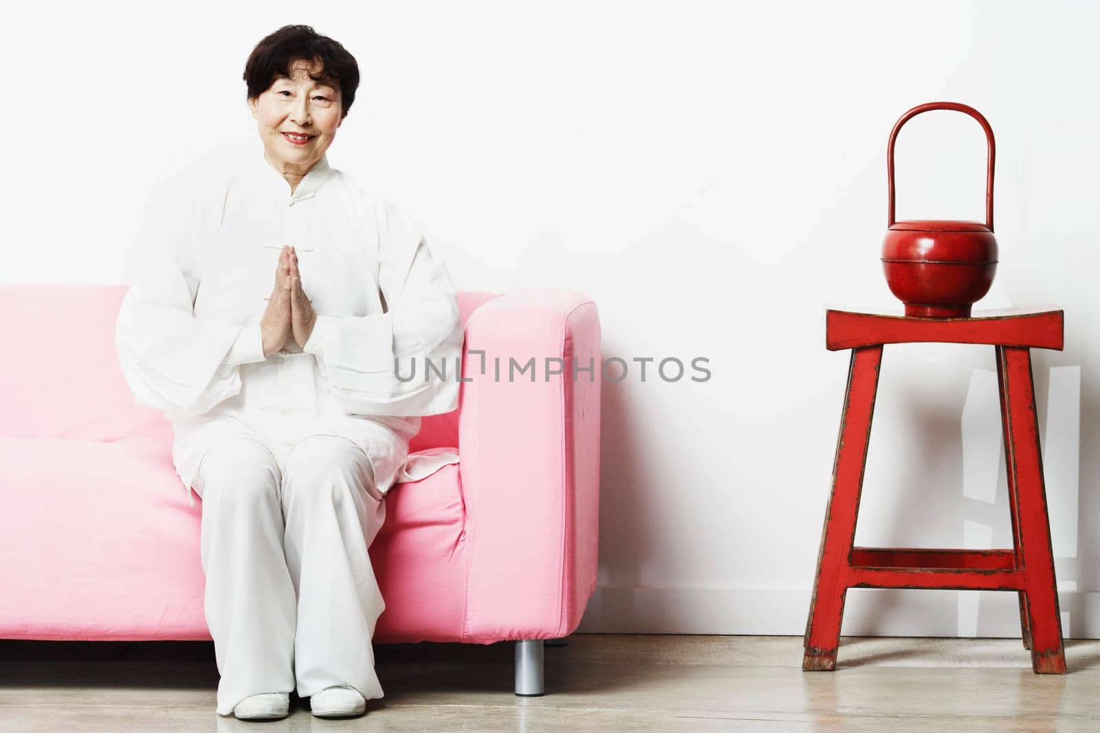 Portrait of a mature woman sitting on a couch