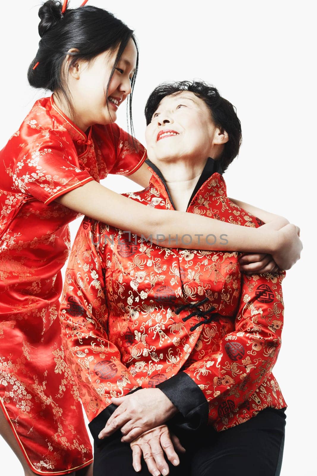 Portrait of a granddaughter hugging her grandmother