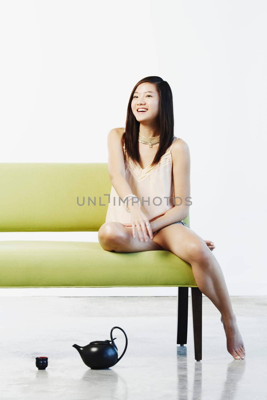 Young woman sitting on a couch