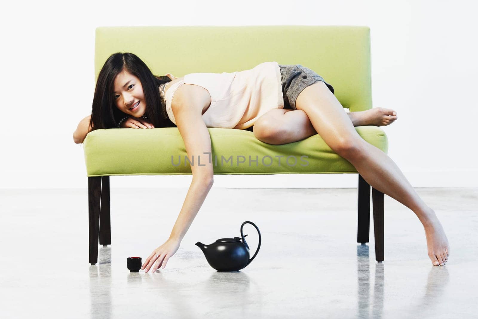 Portrait of a young woman lying down