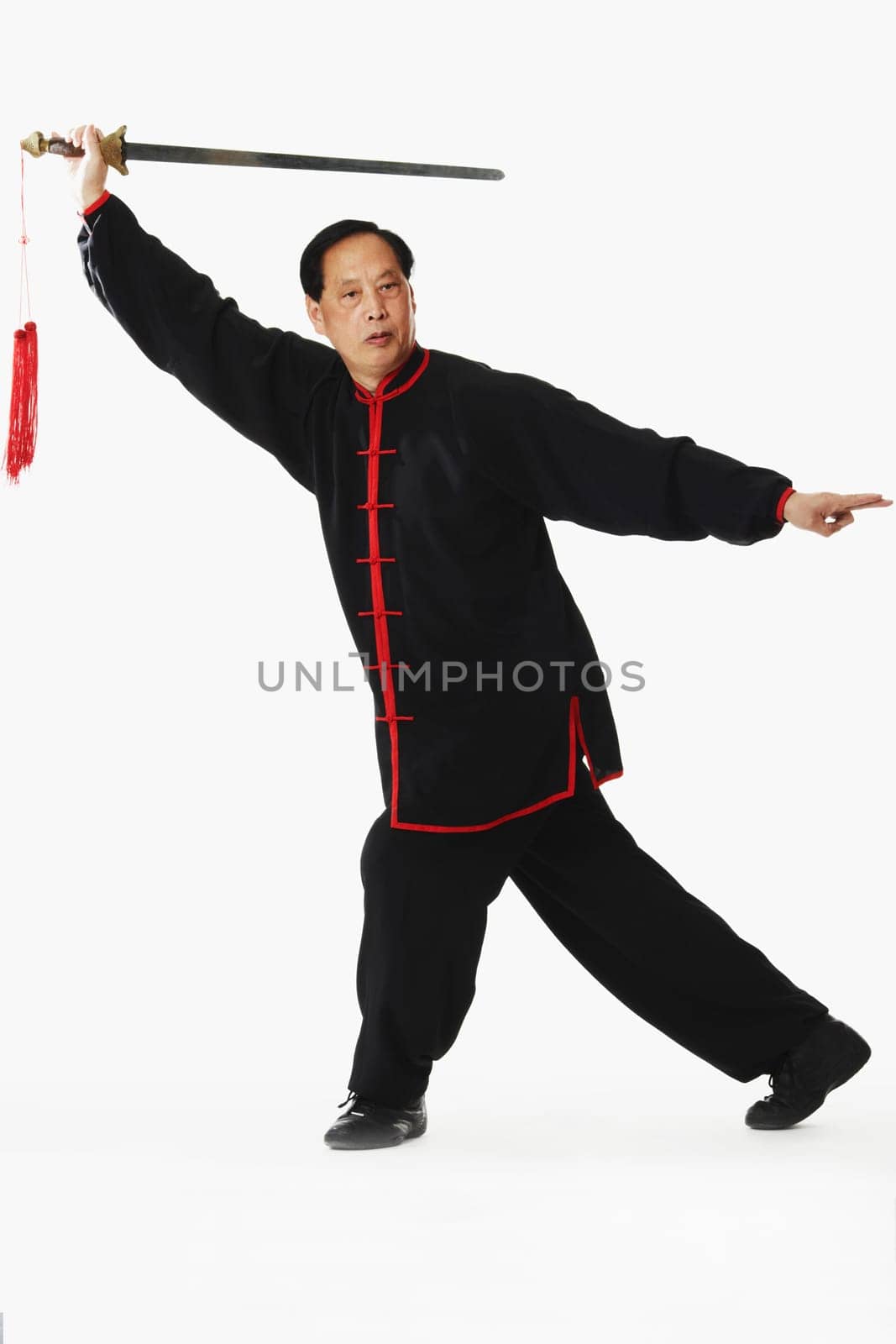 Mature man holding a sword