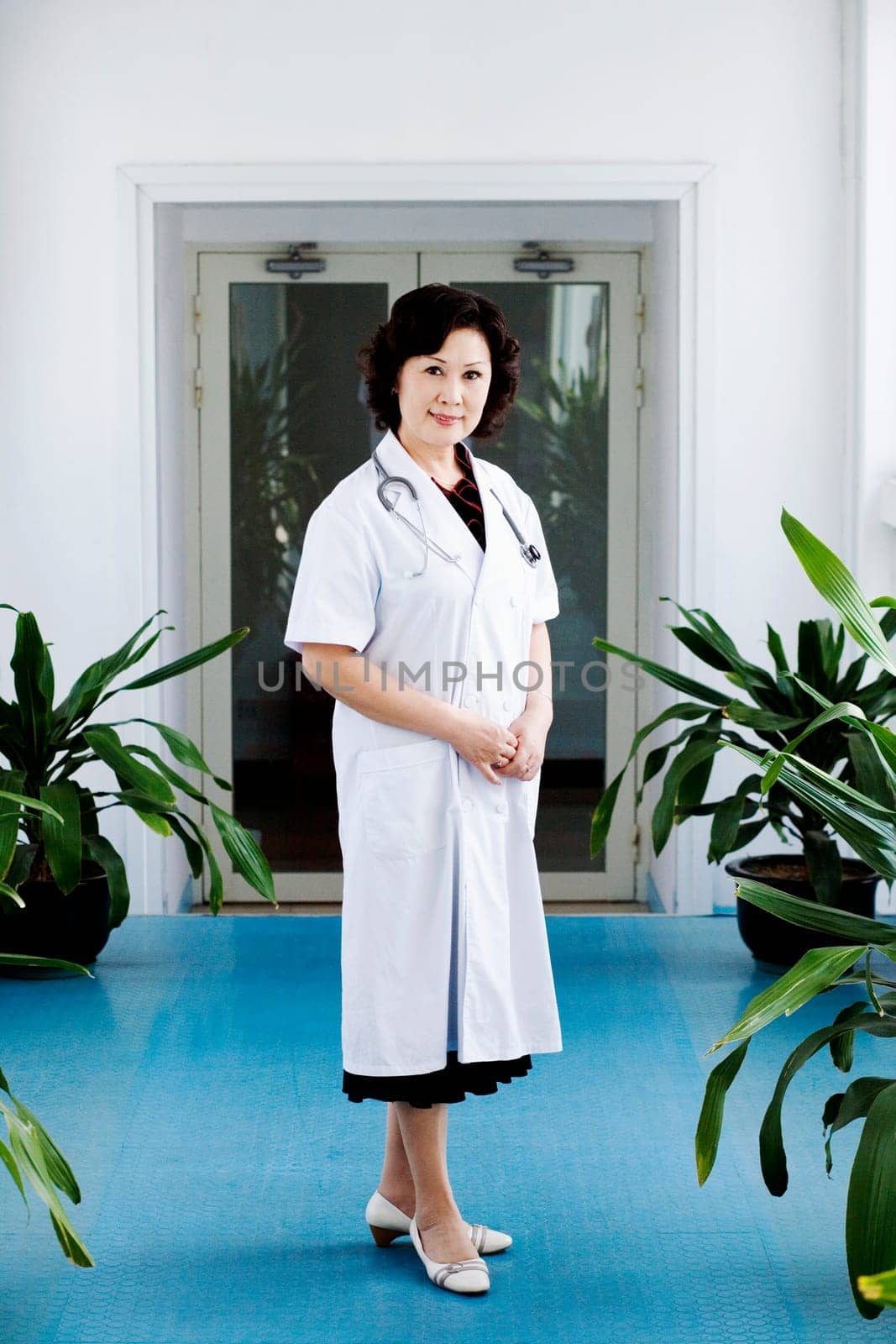 Portrait of a female doctor standing
