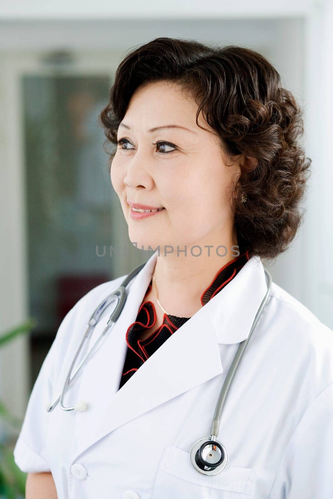 Close-up of a female doctor smiling