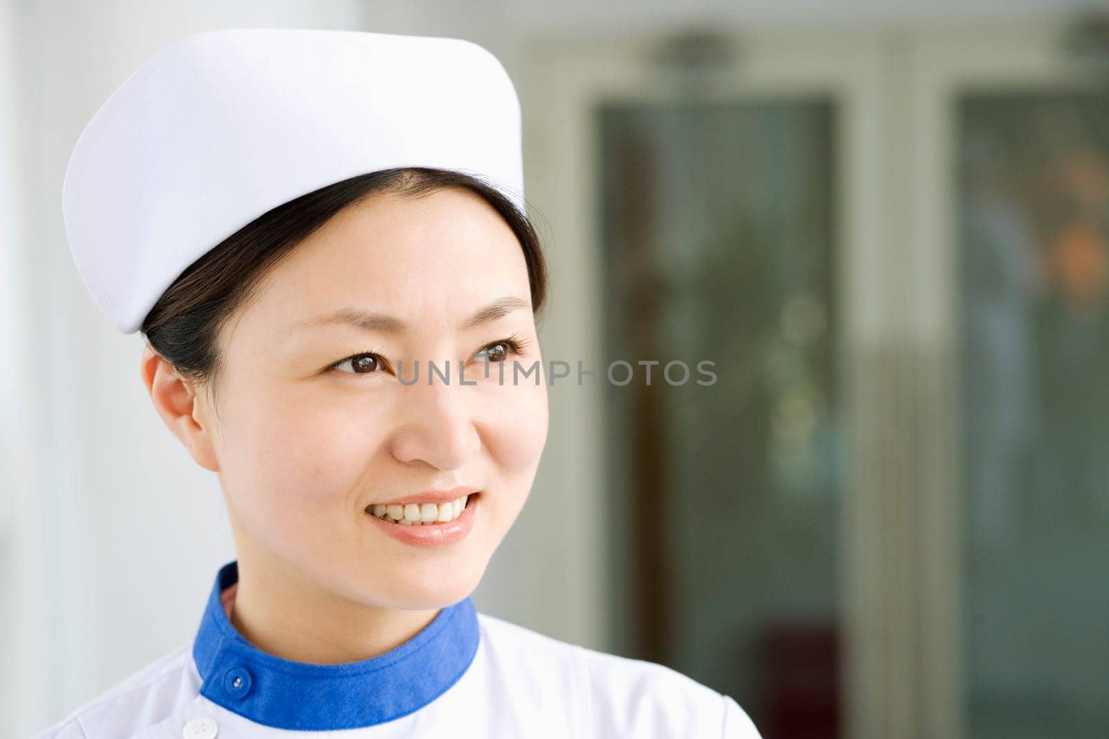 Close-up of a female nurse smiling