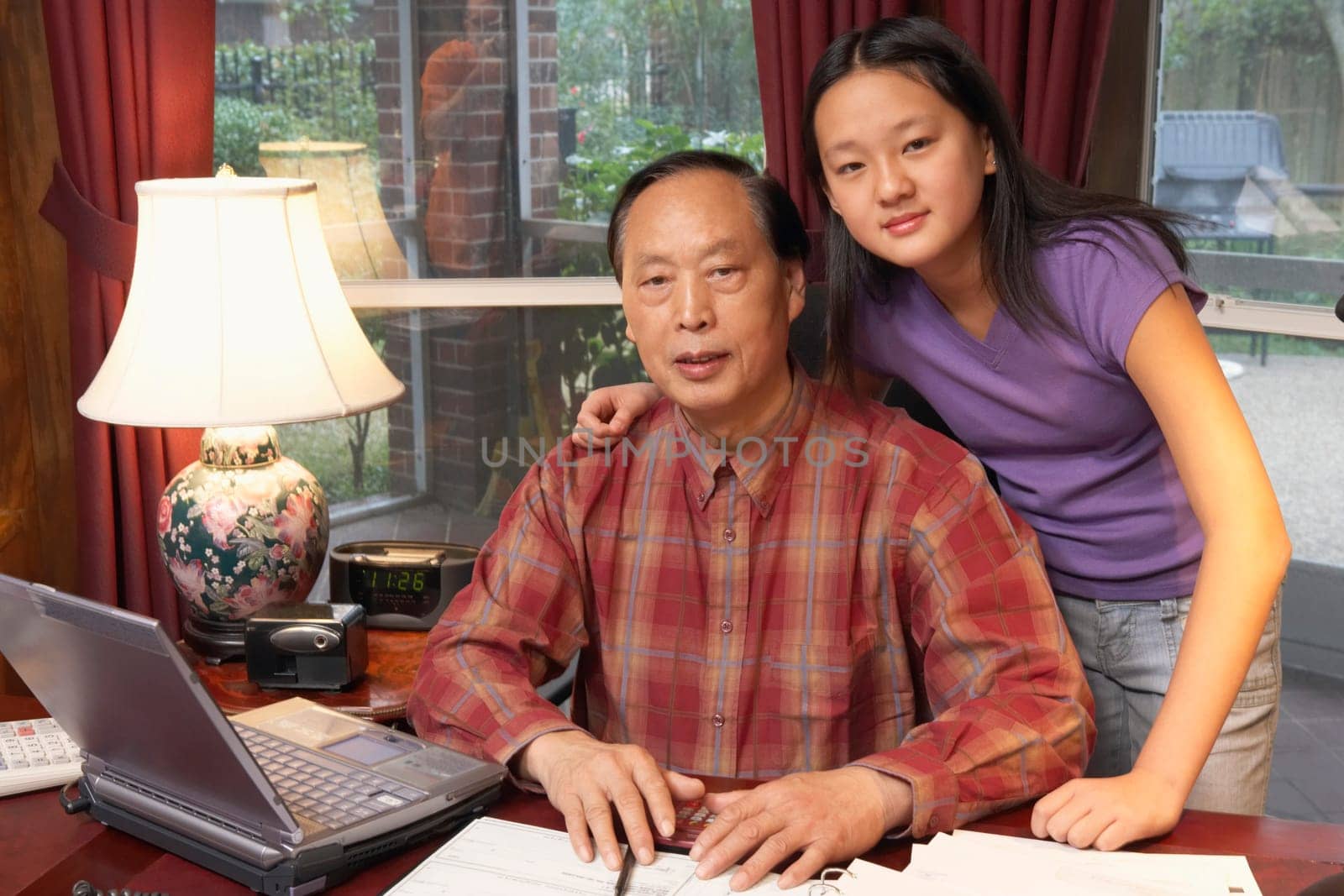 Close-up of a grandfather and his granddaughter