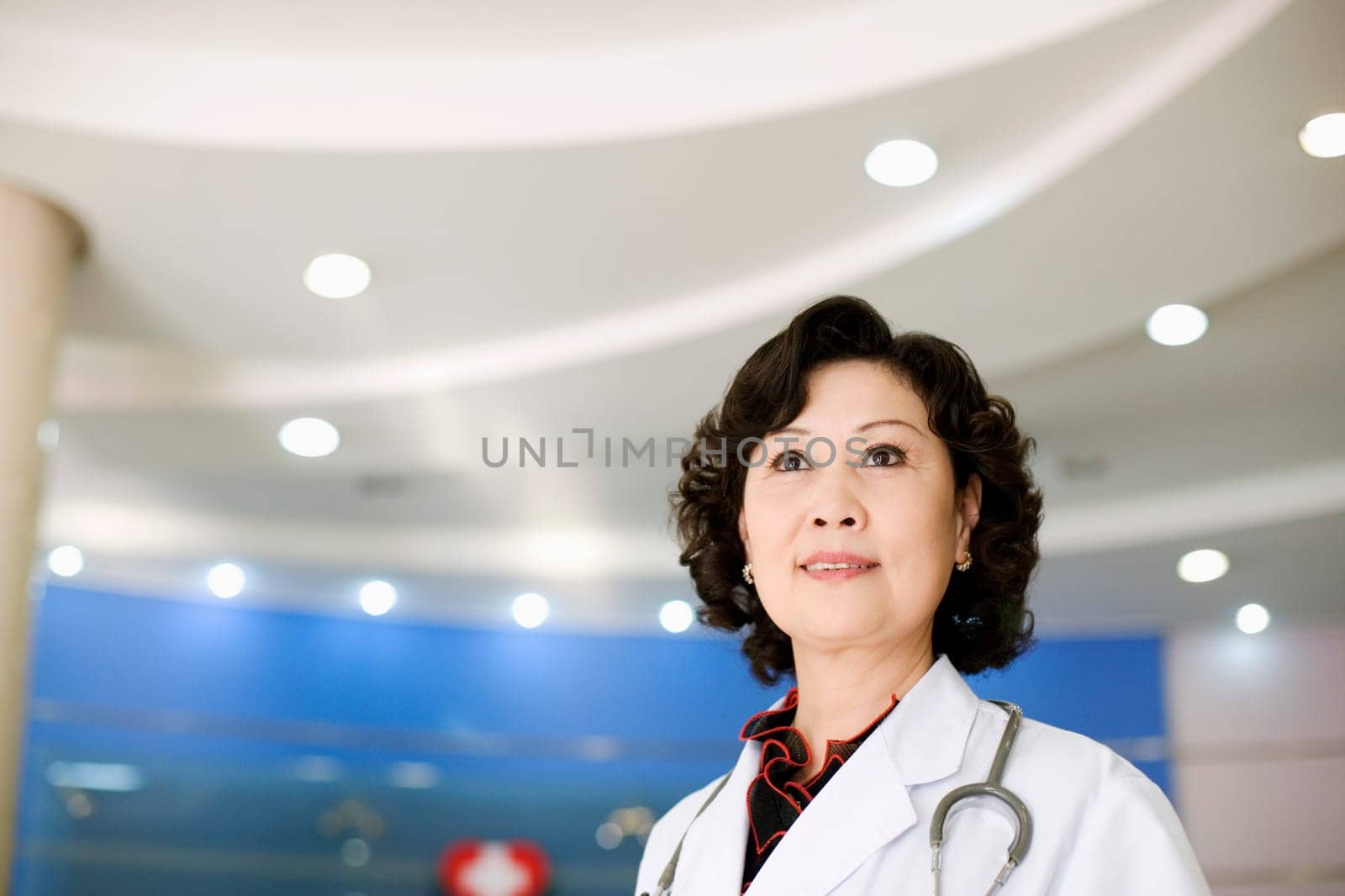 Close-up of a female doctor with a stethoscope around her neck