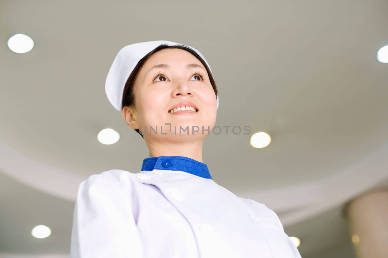 Close-up of a female nurse smiling