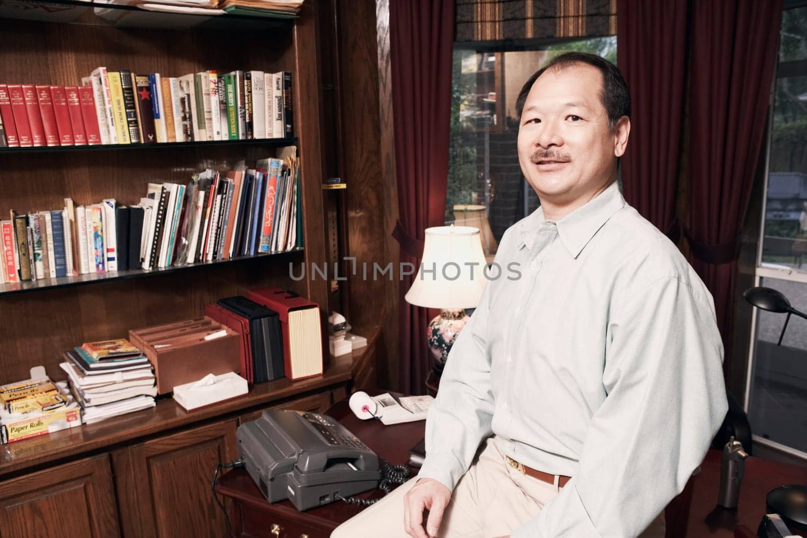 Portrait of a senior man sitting in an office