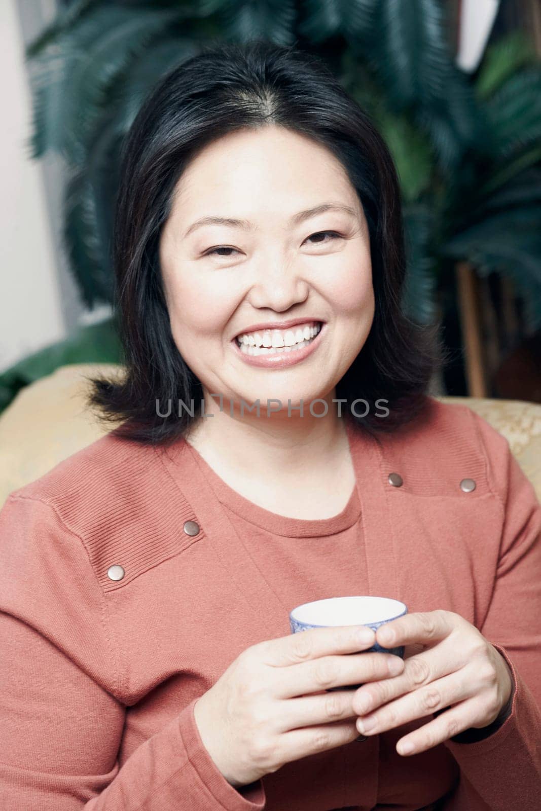 Portrait of a mature woman holding a tea cup