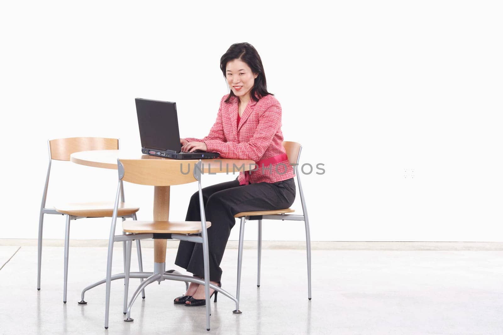 Portrait of a businesswoman using a laptop