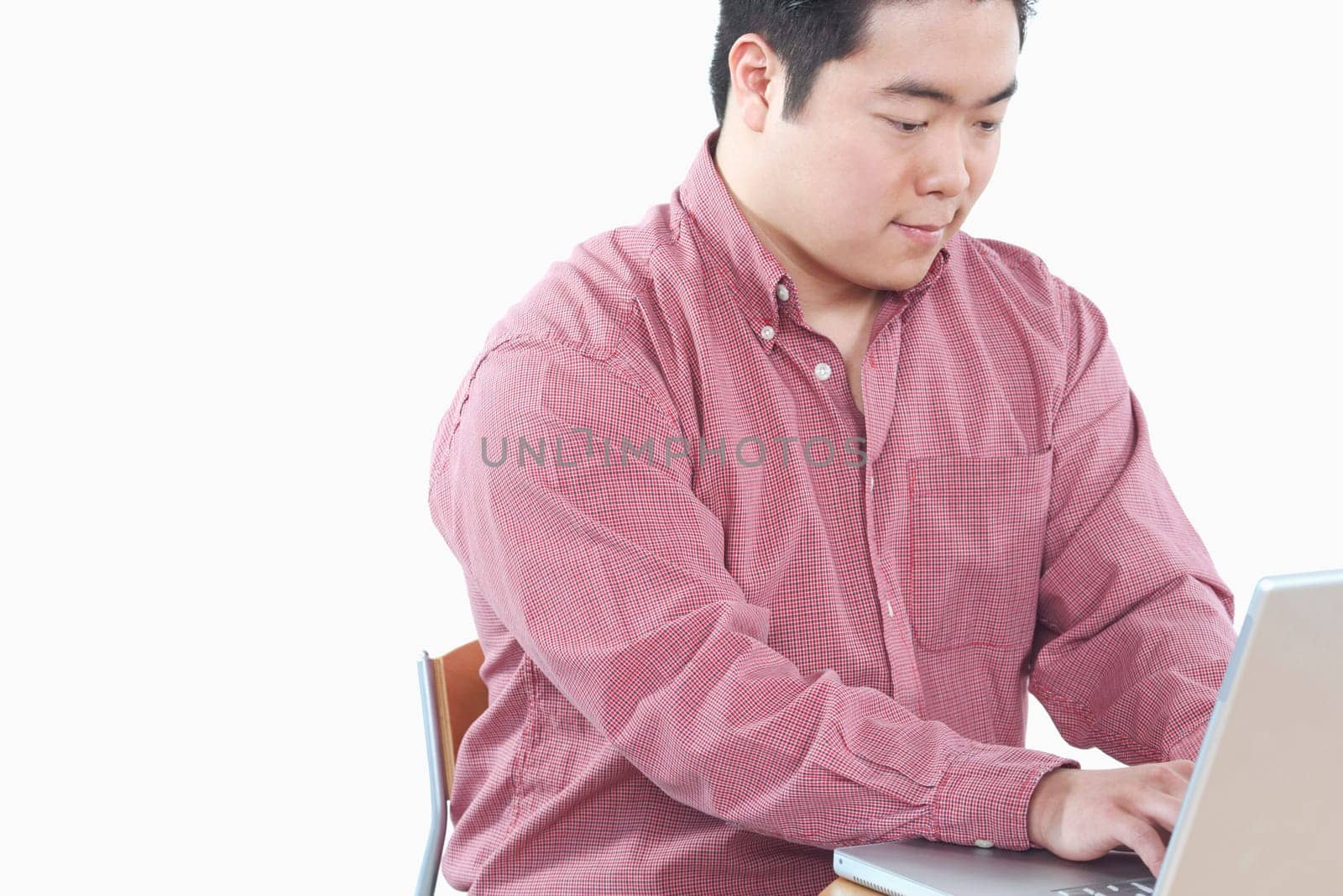 Close-up of a businessman using a laptop