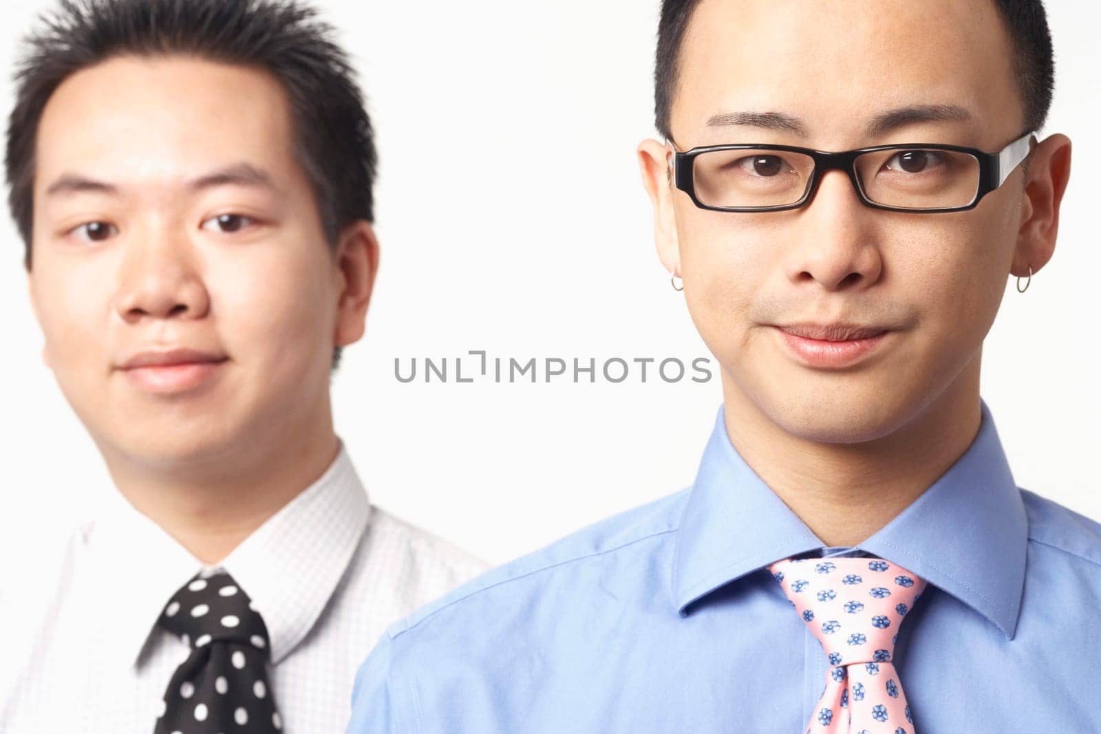 Portrait of two businessmen smiling