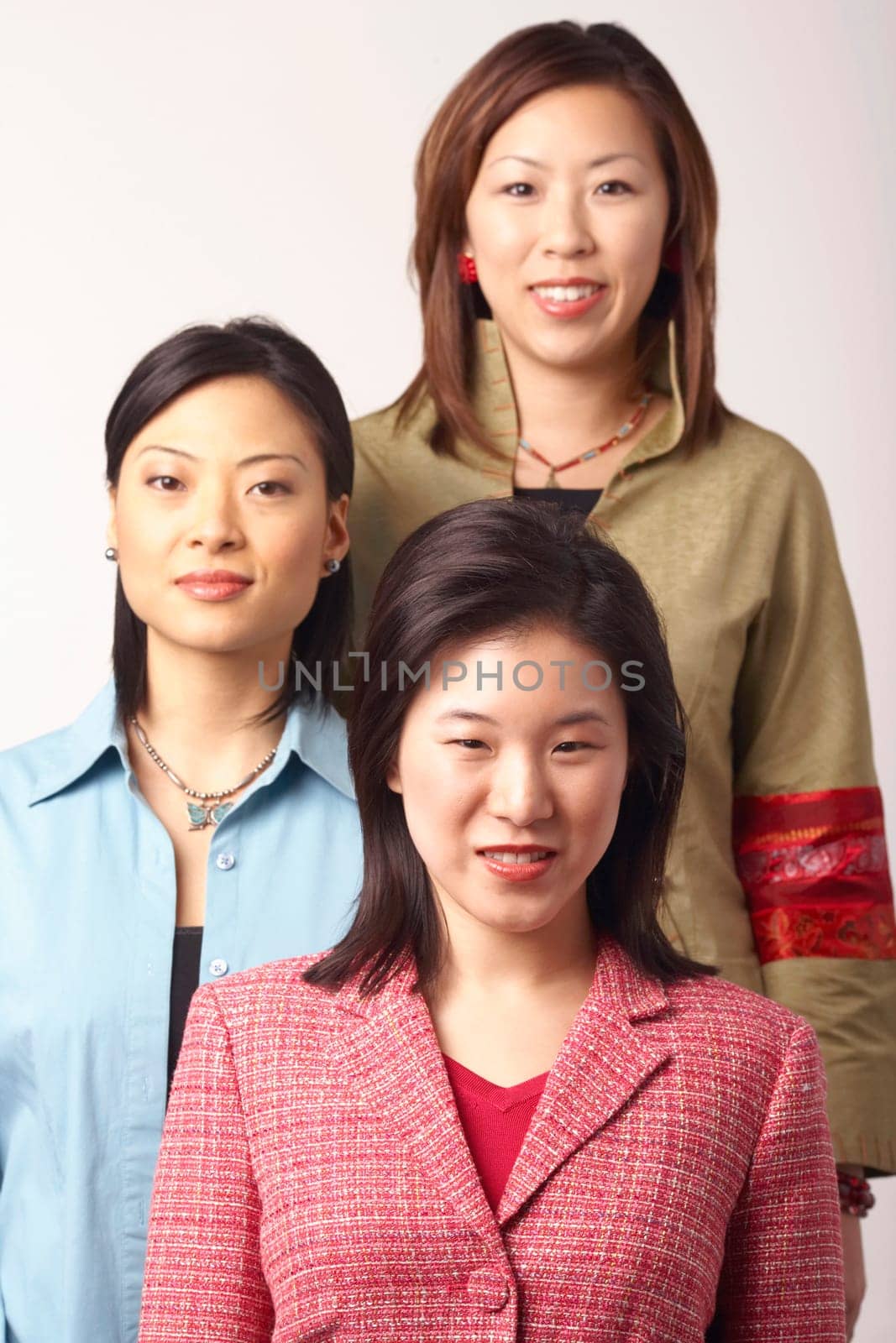 Portrait of three businesswomen smiling