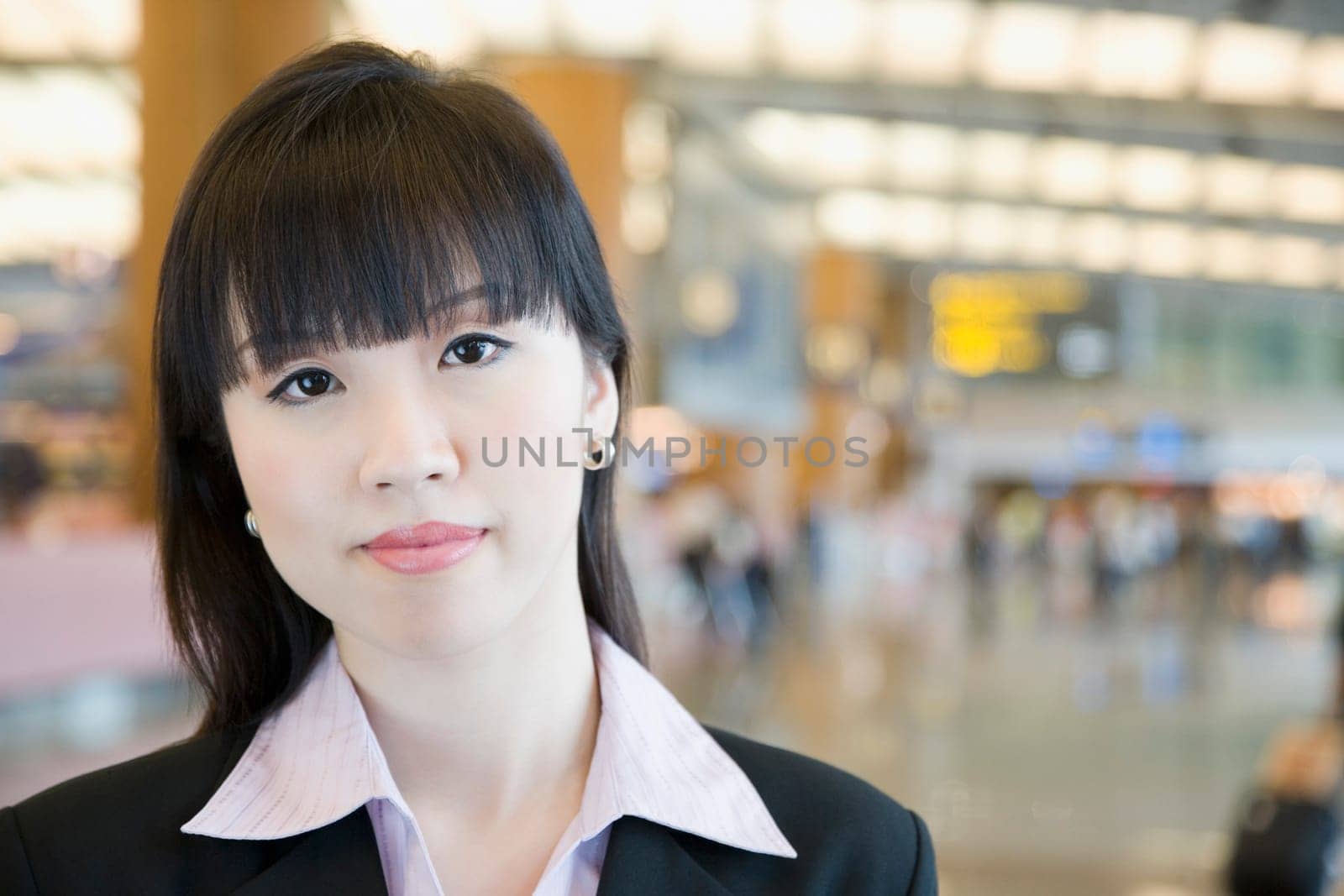 Portrait of a businesswoman at an airport lounge