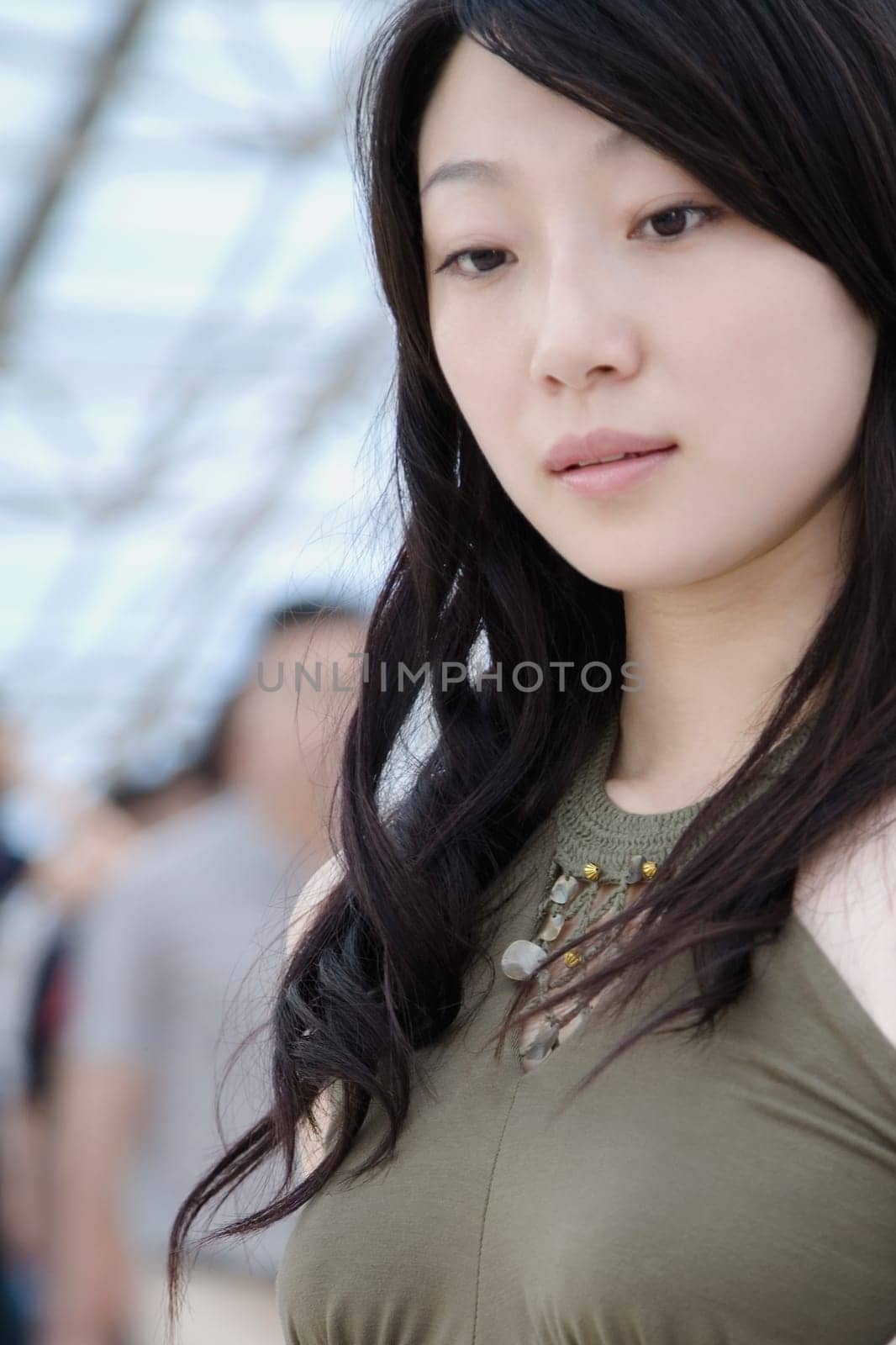 Close-up of a young woman thinking
