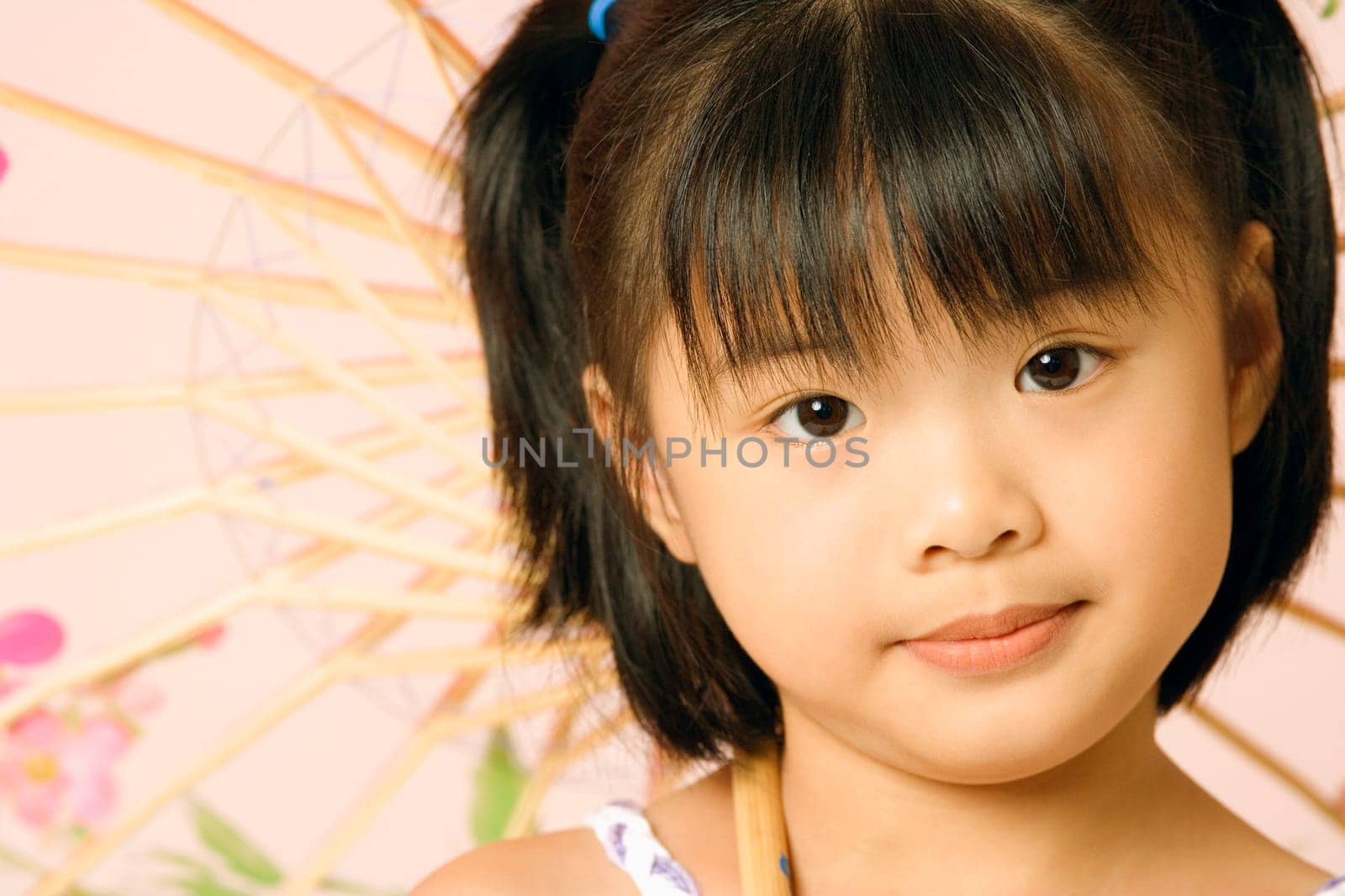 Portrait of a girl with a parasol