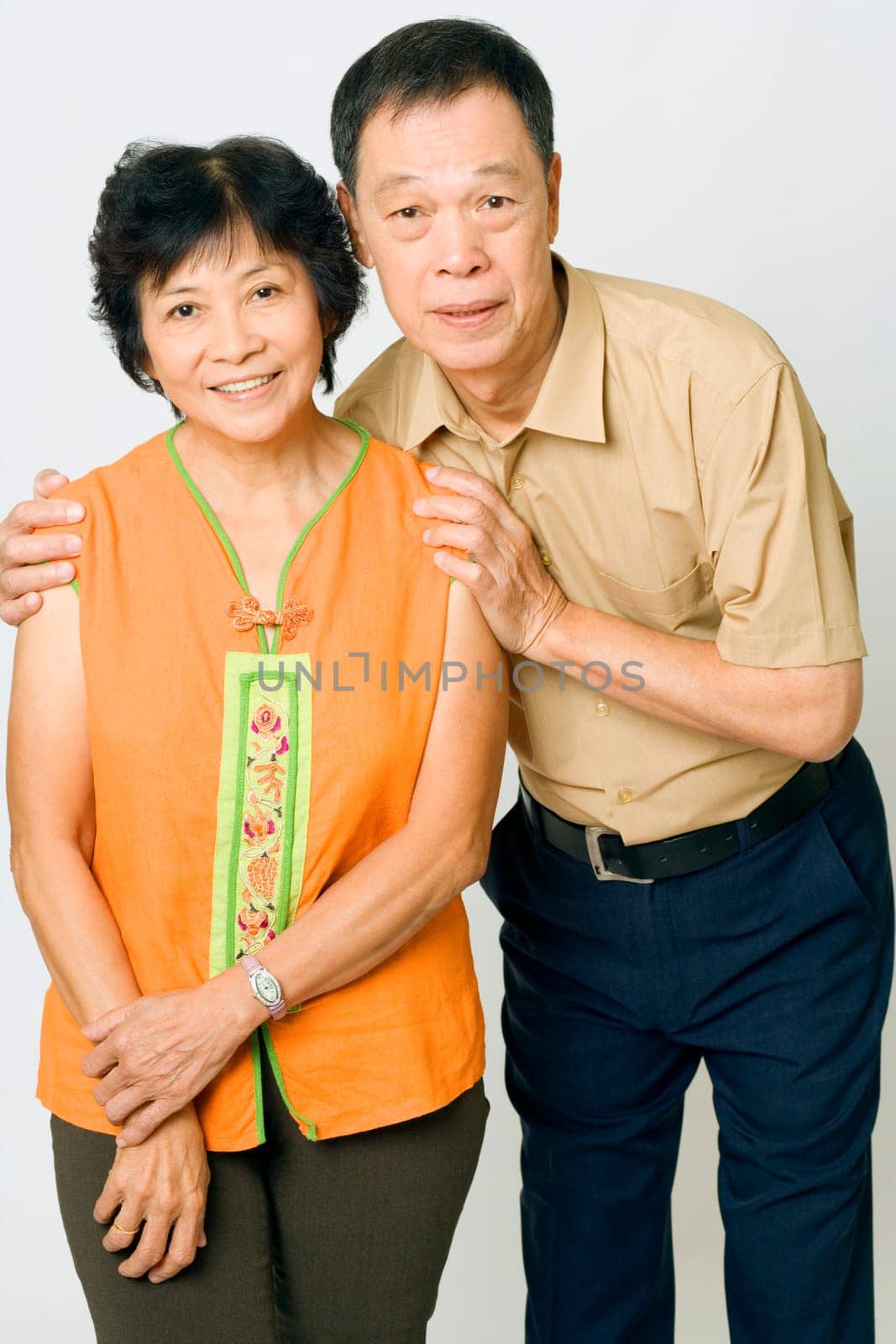 Portrait of a senior man and a mature woman standing