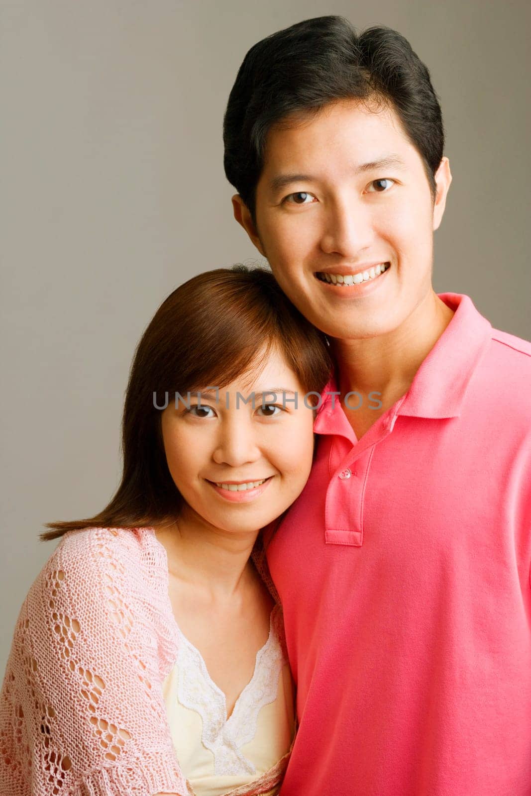 Portrait of a young couple smiling