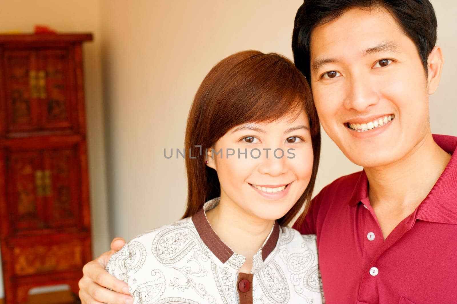 Portrait of a young couple smiling