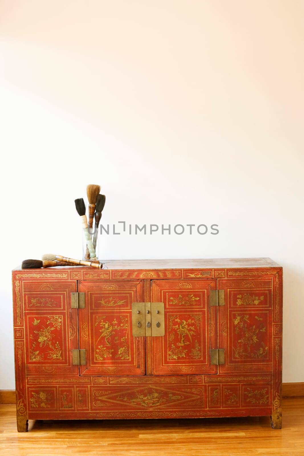 Close-up of a cabinet on a wooden laminate floor
