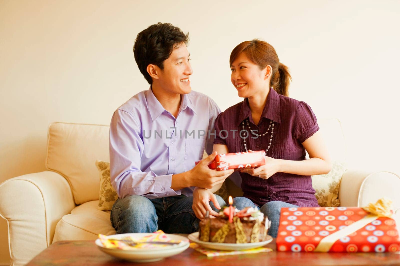 Close-up of a young couple smiling