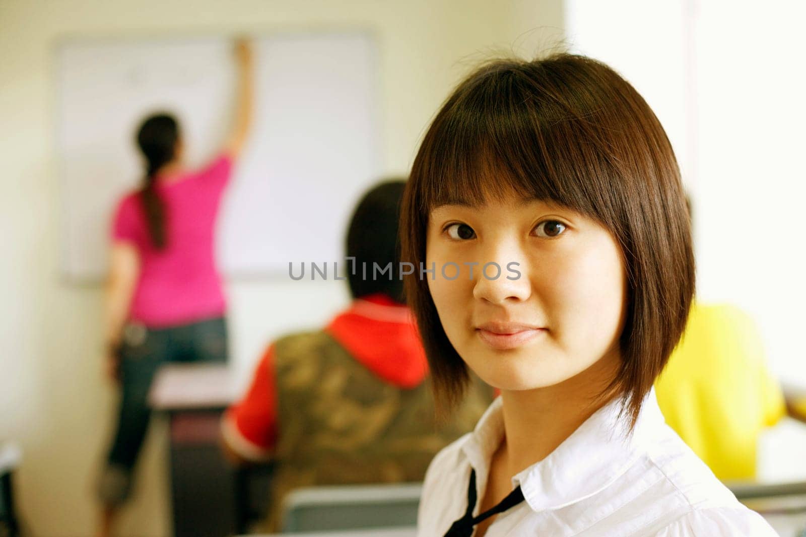 Portrait of a young woman in the classroom