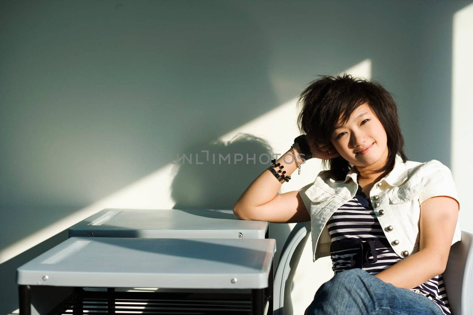 Portrait of a teenage girl sitting in the classroom