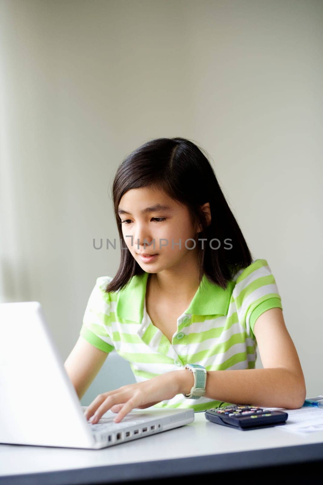 Close-up of a girl using a laptop