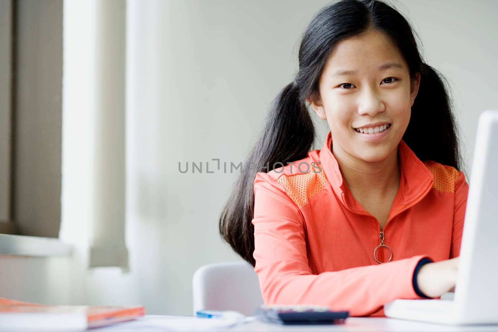 Portrait of a girl using a laptop