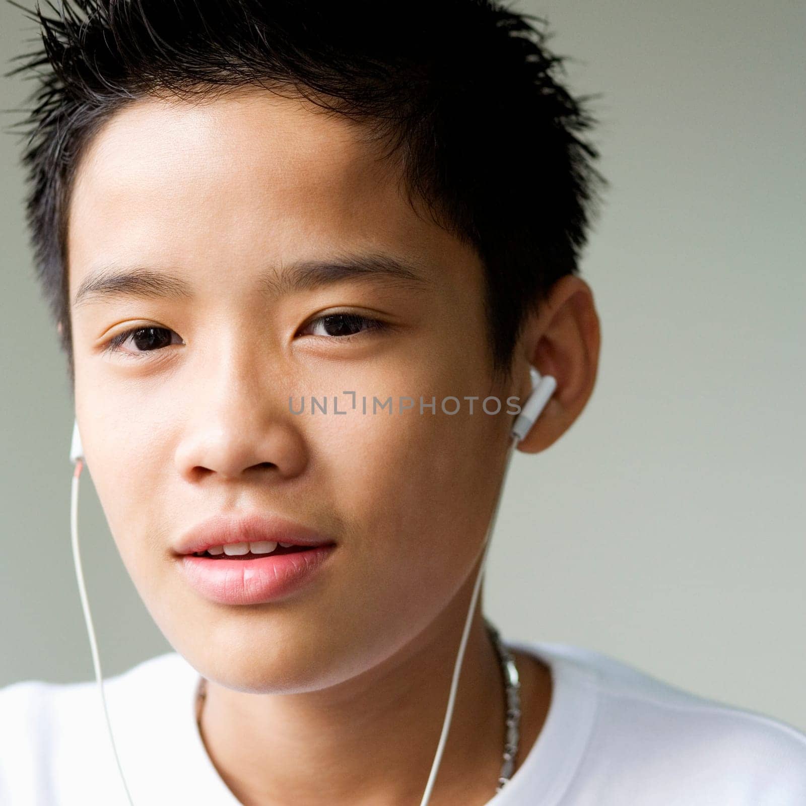 Portrait of a boy listening to headphones