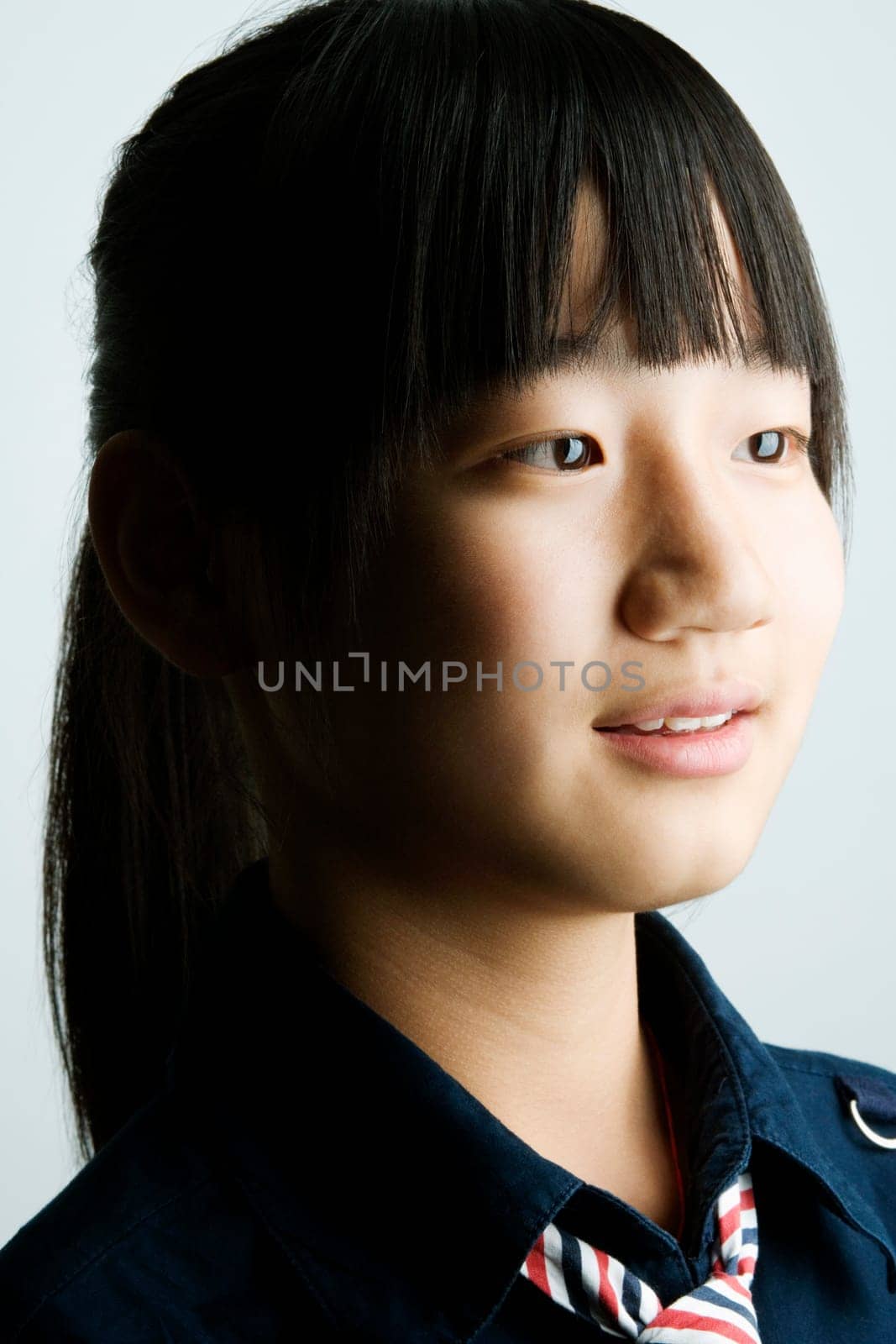 Close-up of a teenage girl smiling