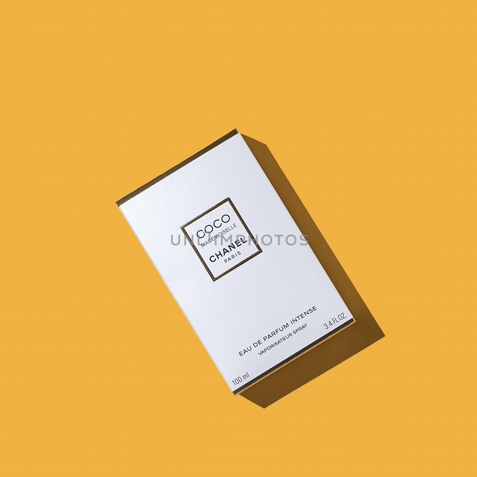 A box of Chanel perfume on a uniform yellow background. Women's perfume series Coco Chanel. 2020-07-05 Samara. Layout, layout, advertising, mockup.