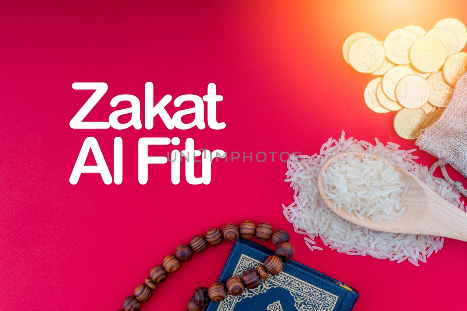 ZAKAT words with Holy Quran, Coins, Rosary and Rice. Zakat concept. Zakat is a form of alm-giving as a religious obligation