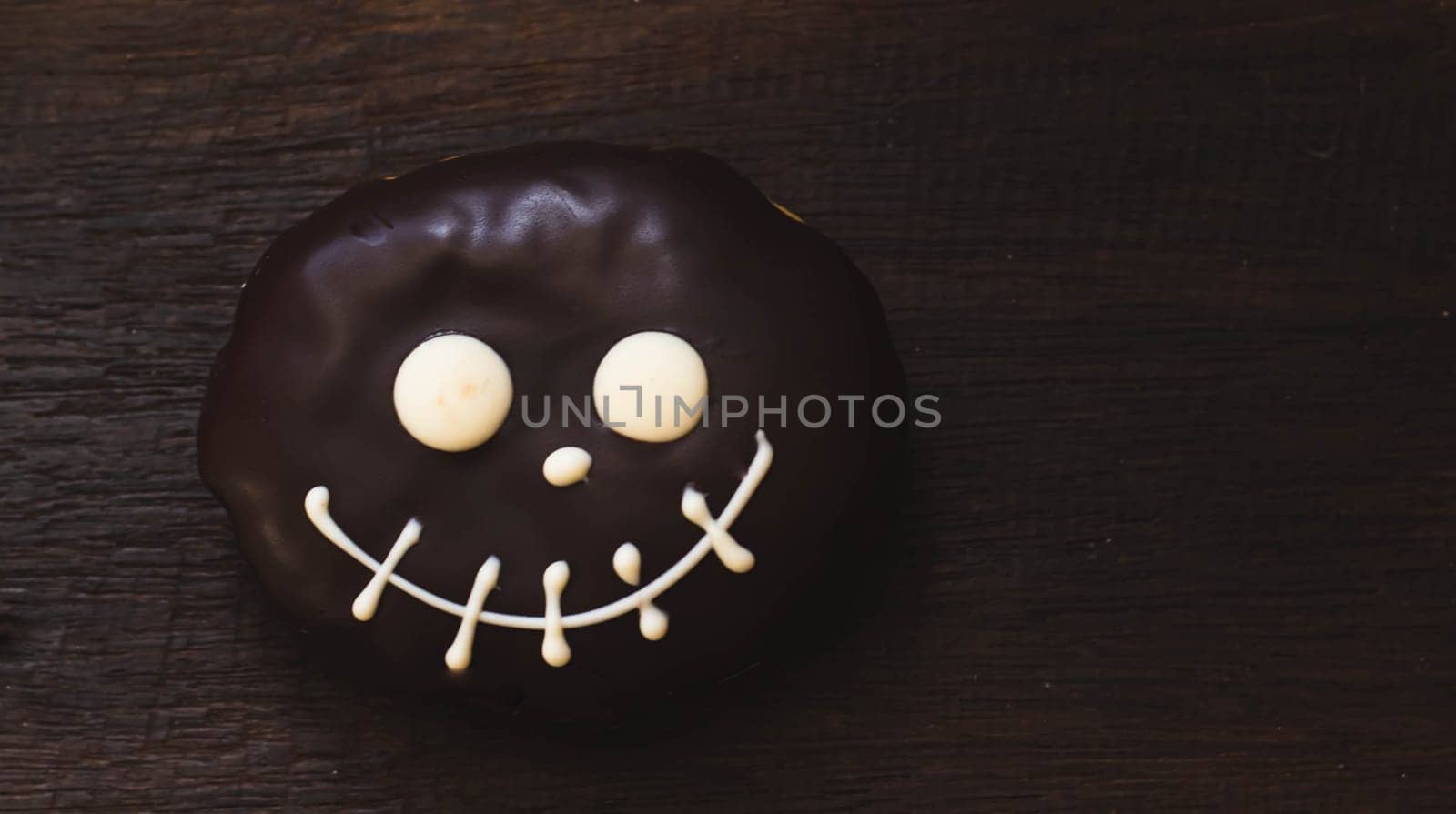Donut Halloween. Donut on the background. Scary Halloween donut.