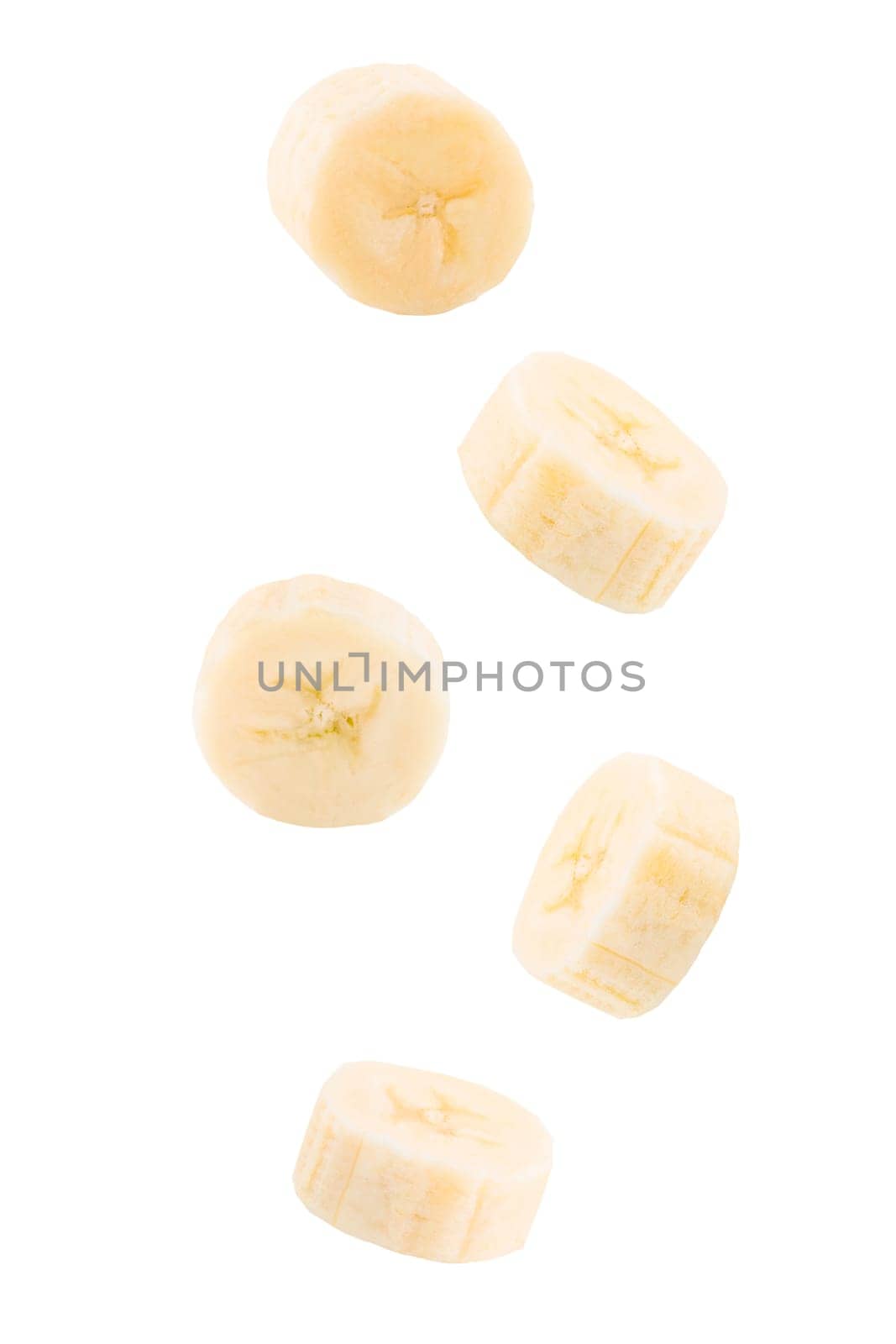 Isolated exotic fruit. Five slices of banana fruits falling down with clipping path. Accurate retouching fruits for package design element. Full depth of field. Food levitation concept.