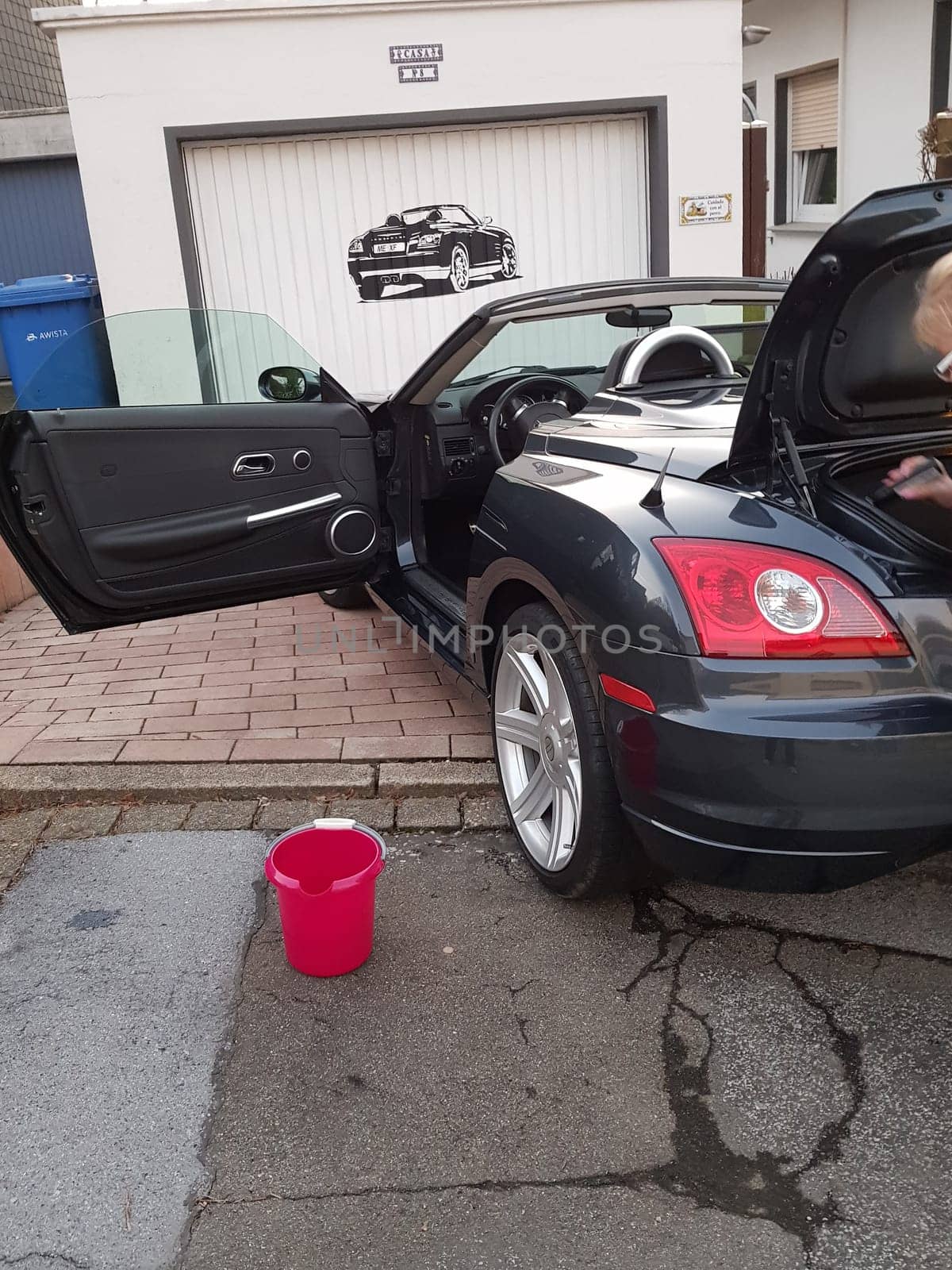 HEILIGENHAUS, NRW, GERMANY - FEBRUARY 26, 2019:.Rear and side view of a Chrysler Crossfire Convertible built between February 2003 and December 2007 by Karmann in Germany.