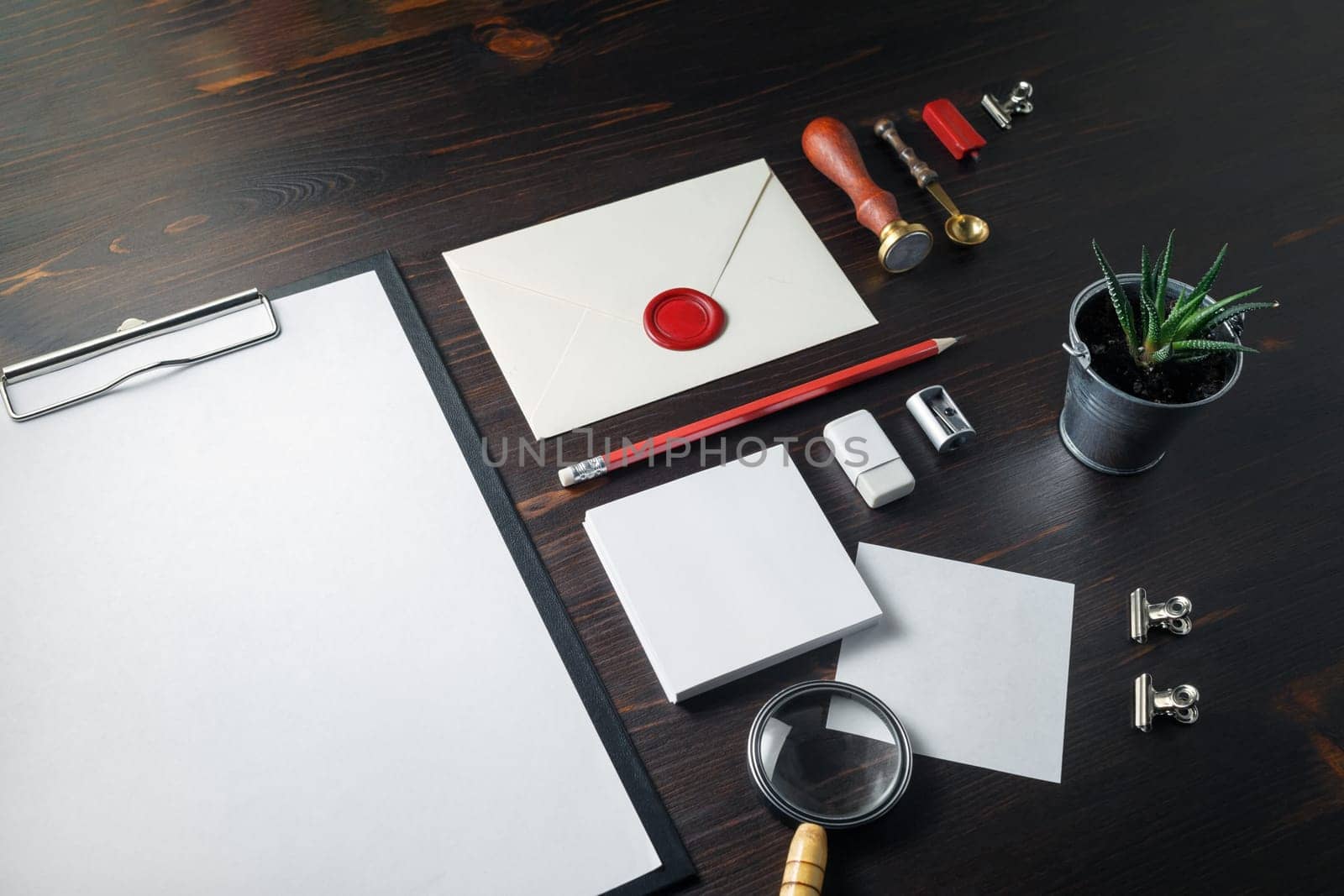 Blank branding identity set on wooden background. Corporate stationery template. For design presentations and portfolios.