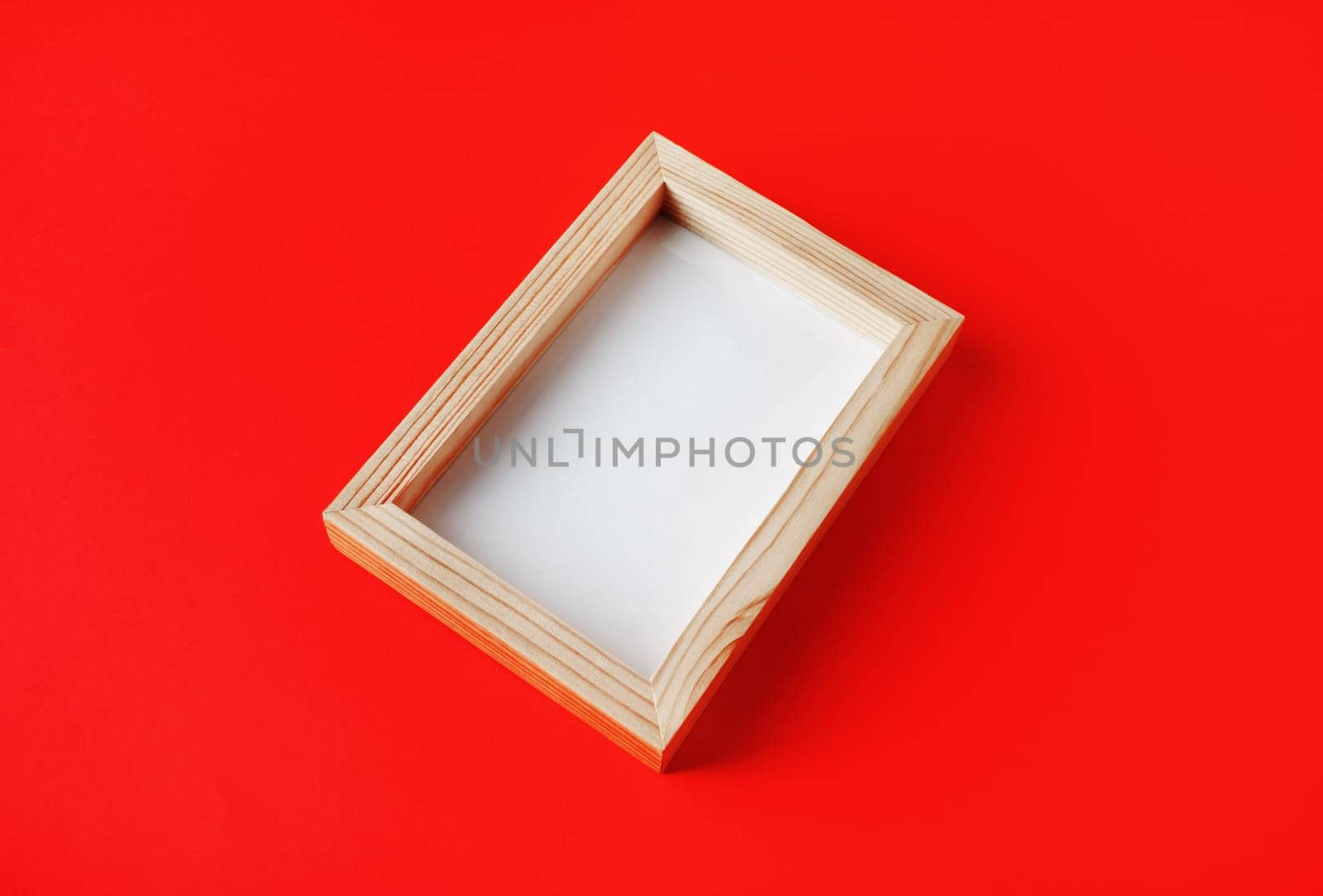 Photo frame on red paper background. Responsive design template.