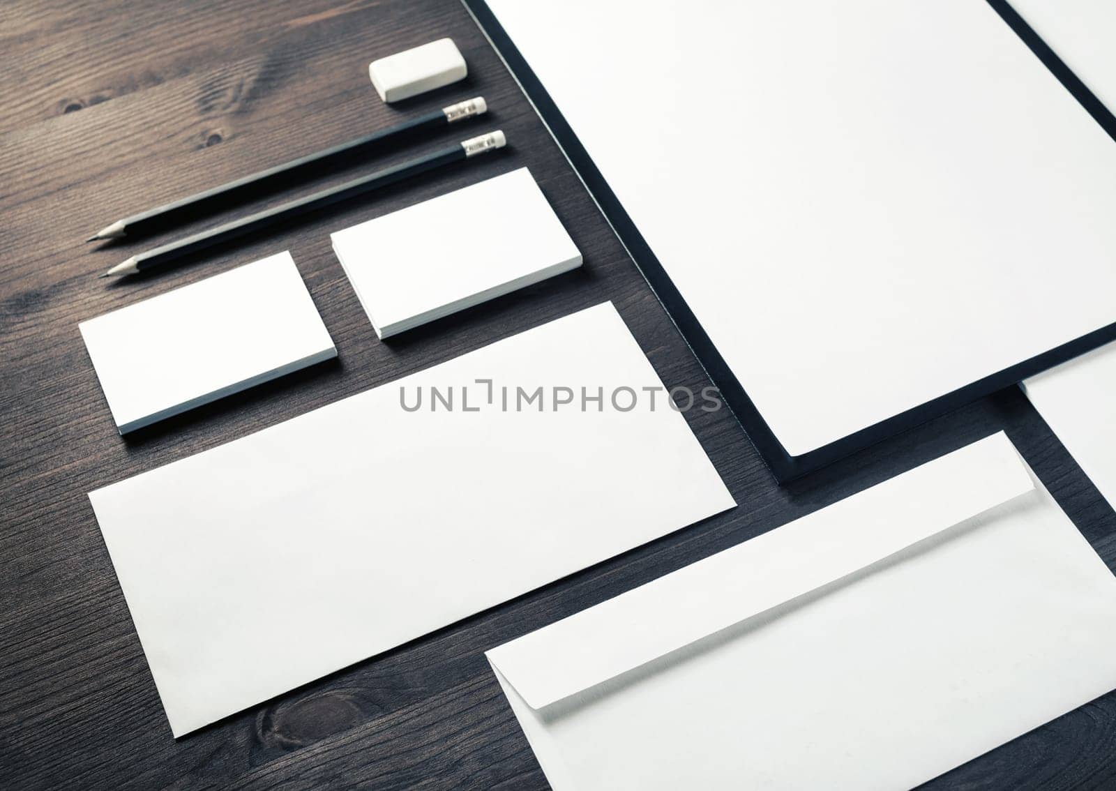 Blank stationery set on wood table background. Template for branding identity. For graphic designers presentations and portfolios.